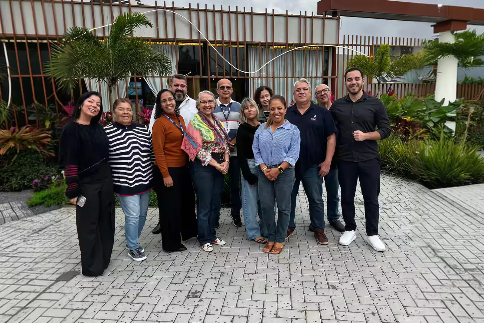 Time de corretores de imóveis de cliente após treinamento comercial da InPulse Imob
